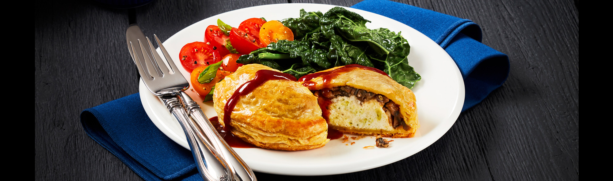 Baked Egg Wellington w/ Blackberry Port Gravy + Steamed Greens